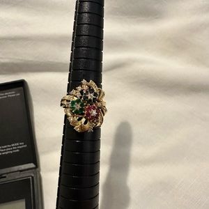 18k gold ring with ruby, sapphire, and emerald, diamond.